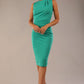 model wearing diva catwalk primula pencil skirt dress in pink with pleating on one side and sleeveless design in colour emerald green front