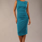  model wearing diva catwalk primula pencil skirt dress in pink with pleating on one side and sleeveless design in colour Magic Blue front image