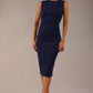 model wearing diva catwalk primula pencil skirt dress in pink with pleating on one side and sleeveless design in colour navy blue front