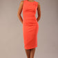  model wearing diva catwalk primula pencil skirt dress in pink with pleating on one side and sleeveless design in colour Hot Coral front image