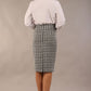 model wearing a diva catwalk Pebble Stretch Perro Skirt, pencil skirt, below the knee length in black and white with Houndstooth Print