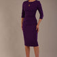 model is wearing the Diva Catwalk Ubrique pencil dress with Long sleeves and keyhole detail in Deep Purple fabric colour (Deep Purple)