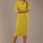 model is wearing the Diva Catwalk Ubrique pencil dress with Long sleeves and keyhole detail in Citrus Green fabric colour front (Citrus Green)