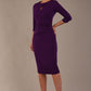 model is wearing the Diva Catwalk Ubrique pencil dress with Long sleeves and keyhole detail in Deep Purple fabric colour (Deep Purple)