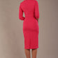 brunette model wearing diva catwalk ubrique pencil dress with a keyhole detail and sleeves in fuchsia pink back (Fuchsia Pink)