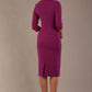 model wearing diva catwalk ubrique pencil dress with a keyhole detail and sleeves in hollyhock purple colour back (Hollyhock Purple)