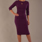 model is wearing the Diva Catwalk Ubrique pencil dress with Long sleeves and keyhole detail in Imperial Purple fabric colour (Imperial Purple)