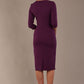 model is wearing the Diva Catwalk Ubrique pencil dress with Long sleeves and keyhole detail in Imperial Purple fabric colour back (Imperial Purple)