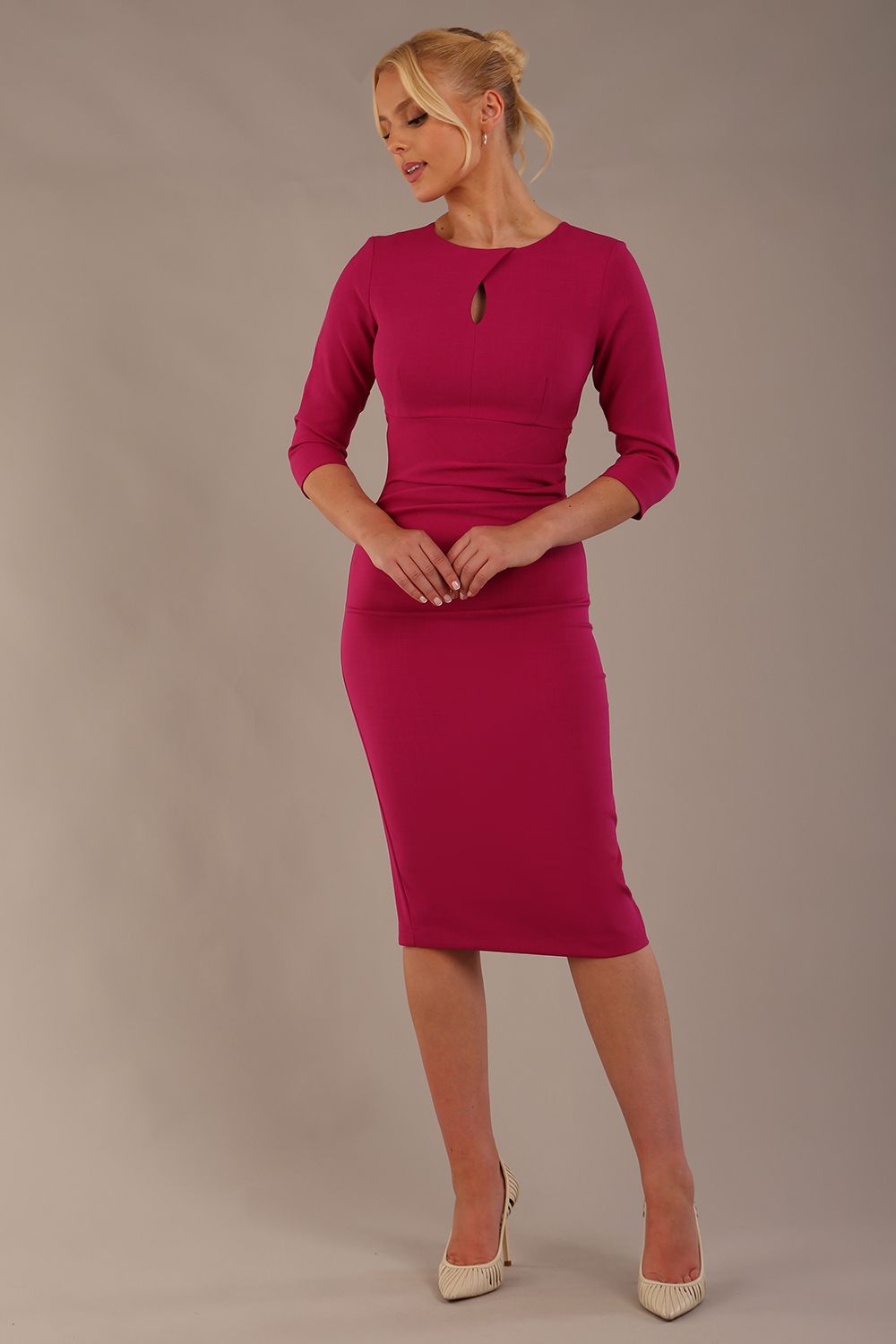 model wearing diva catwalk ubrique pencil dress with a keyhole detail and sleeves in Magenta Haze colour front (Magenta Haze)