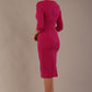model wearing diva catwalk ubrique pencil dress with a keyhole detail and sleeves in Magenta Haze colour back (Magenta Haze)