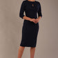 model is wearing the Diva Catwalk Ubrique pencil dress with Long sleeves and keyhole detail in Navy Blue fabric colour (Navy)