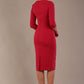 model is wearing the Diva Catwalk Ubrique pencil dress with Long sleeves and keyhole detail in Raspberry Pink fabric colour (Raspberry Pink)
