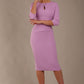 The model is wearing the Diva Catwalk Ubrique pencil dress with Long sleeves and keyhole detail in Sheer Lilac fabric colour (Sheer Lilac)
