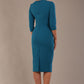 model wearing diva catwalk ubrique pencil dress with a keyhole detail and sleeves in teal colour back (Teal)