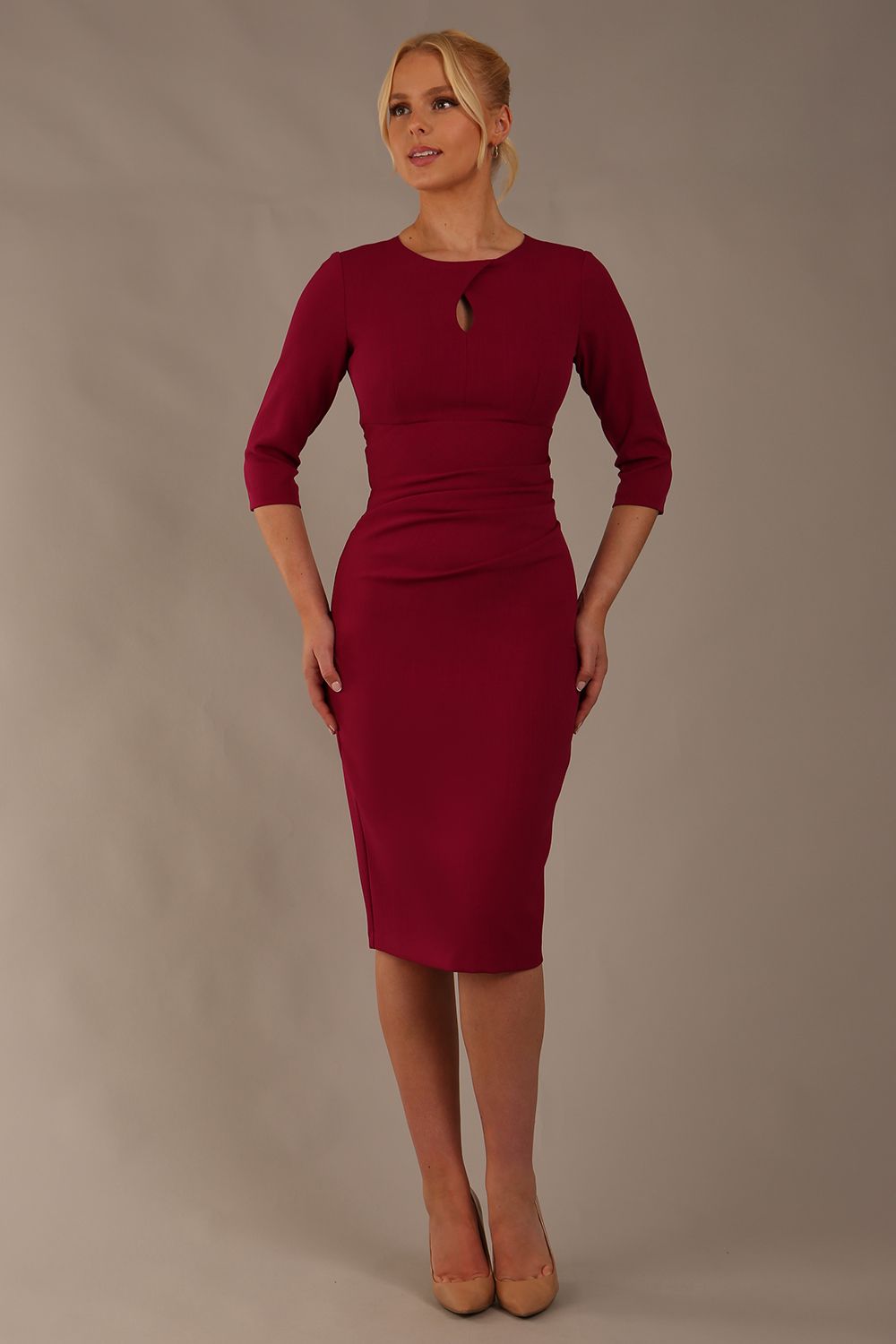 model wearing diva catwalk ubrique pencil dress with a keyhole detail and sleeves in berry pink colour front (Berry Pink)