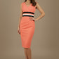 Woman wearing a coral dress with a black and white stripe on a beige background (Sea Coral & Black)