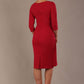 model is wearing diva catwalk jacky dress with rounded neckline 3/4 sleeve and bow detail on the waist in Dazzle pink back view