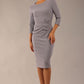 Model wearing diva catwalk Seed Andante Pencil Skirt Dress with 3/4 sleeve and bow detail at waistline in Sky Grey front