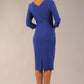 Model wearing diva catwalk Seed Andante Pencil Skirt Dress with 3/4 sleeve and bow detail at waistline in Monaco Blue back