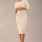 Model wearing diva catwalk Seed Andante Pencil Skirt Dress with 3/4 sleeve and bow detail at waistline in Sandy Cream front 