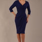 model wearing diva pencil dress tulip design with overlapping pencil skirt with 3 4 sleeves in colour oxford blue front (Oxford Blue)
