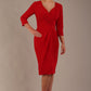 model wearing diva pencil dress tulip design with overlapping pencil skirt with 3 4 sleeves in colour scarlet red front (Scarlet Red)