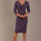 model wearing diva pencil dress tulip design with overlapping pencil skirt with 3 4 sleeves in colour dark mauve front (Mauve)