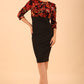 Model wearing the Diva Chiltern Print dress with round neckline in autumnal print front image