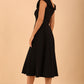 model is wearing divacatwalk Chesterton Sleeveless a-line swing dress in Black with oversized collar