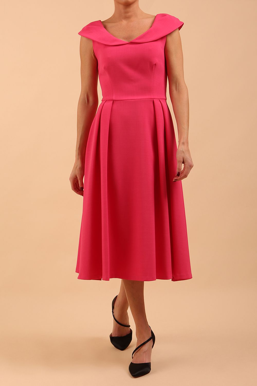 model is wearing divacatwalk Chesterton Sleeveless a-line swing dress in fuchsia pink with oversized collar front