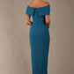 model wearing diva catwalk vegas calf length Teal midaxi dress with wide bardot neckline and open shoulders with a large opening at the front of the skirt with pleating coming down long skirt back (Tropical Teal)