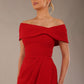 model wearing diva catwalk vegas calf length midaxi dress with wide bardot neckline and open shoulders with a large opening at the front of the skirt with pleating coming down long skirt front close up in scarlet red (Scarlet Red)
