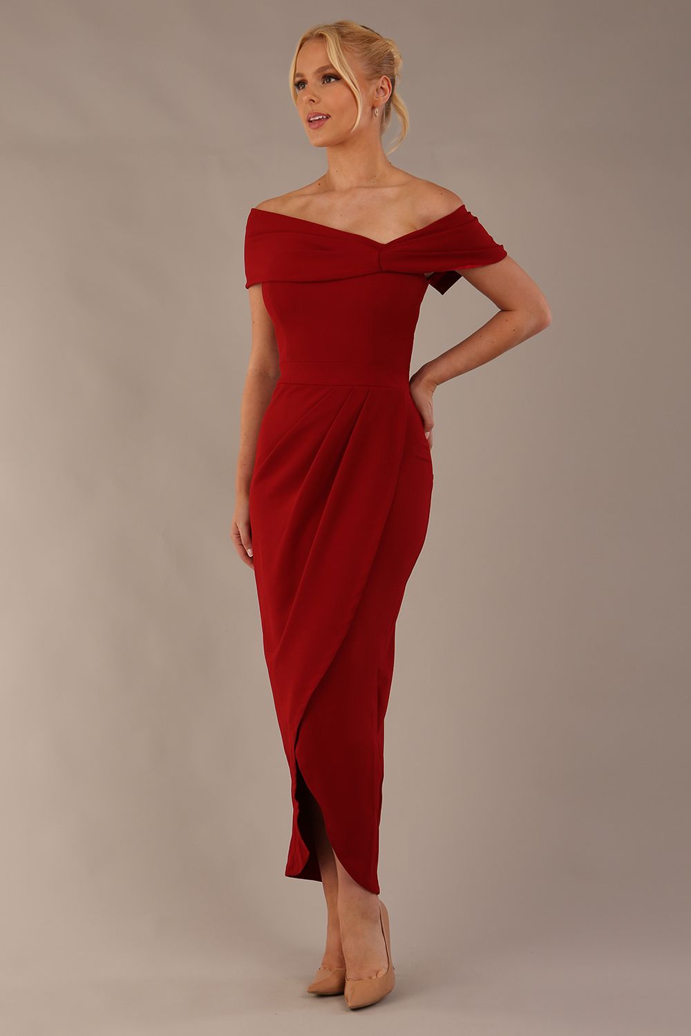 model wearing diva catwalk vegas calf length rosewood red midaxi dress with wide bardot neckline and open shoulders with a large opening at the front of the skirt with pleating coming down long skirt front (Rosewood Red)