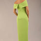 brunette model wearing diva catwalk vegas calf length lime green midaxi dress with wide bardot neckline and open shoulders with a large opening at the front of the skirt with pleating coming down long skirt back