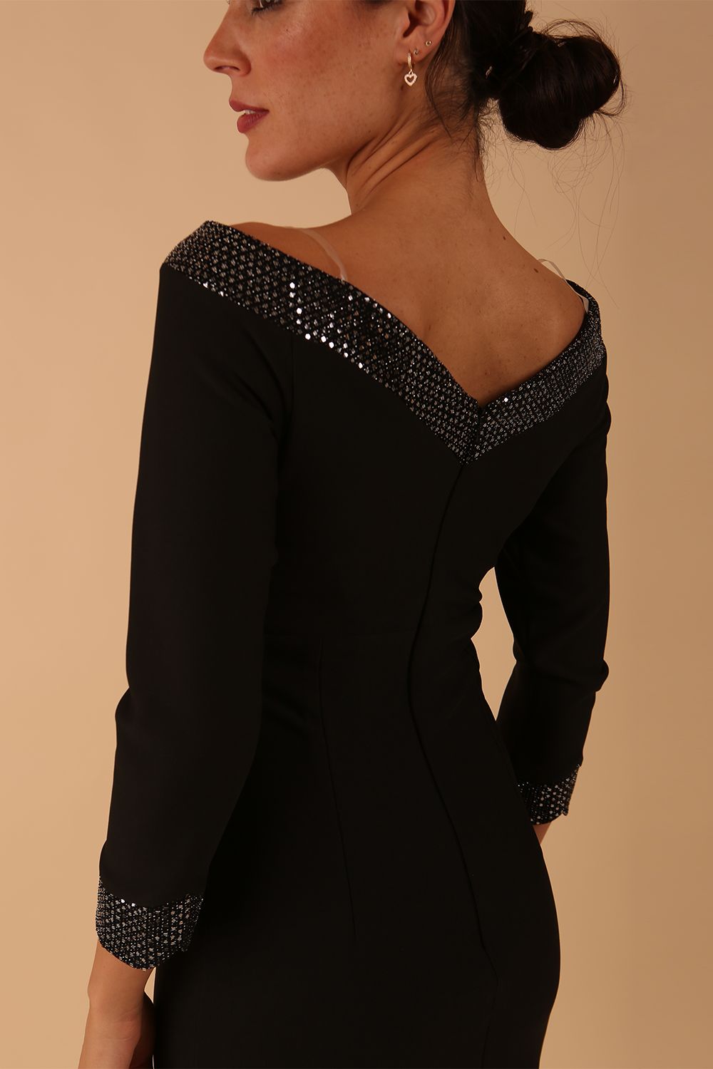 Model wearing a diva catwalk ToTo Bardot Neckline Off Shoulder Pencil Dress in Black colour