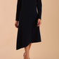 model is wearing diva catwalk dartington asymmetric skirt midaxi long sleeve dress with rounded pleated neckline a-line style in navy blue front