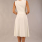 model wearing Diva Catwalk Patina A-line Swing Sleeveless dress with v-neckline with detail in Ivory-White colour back