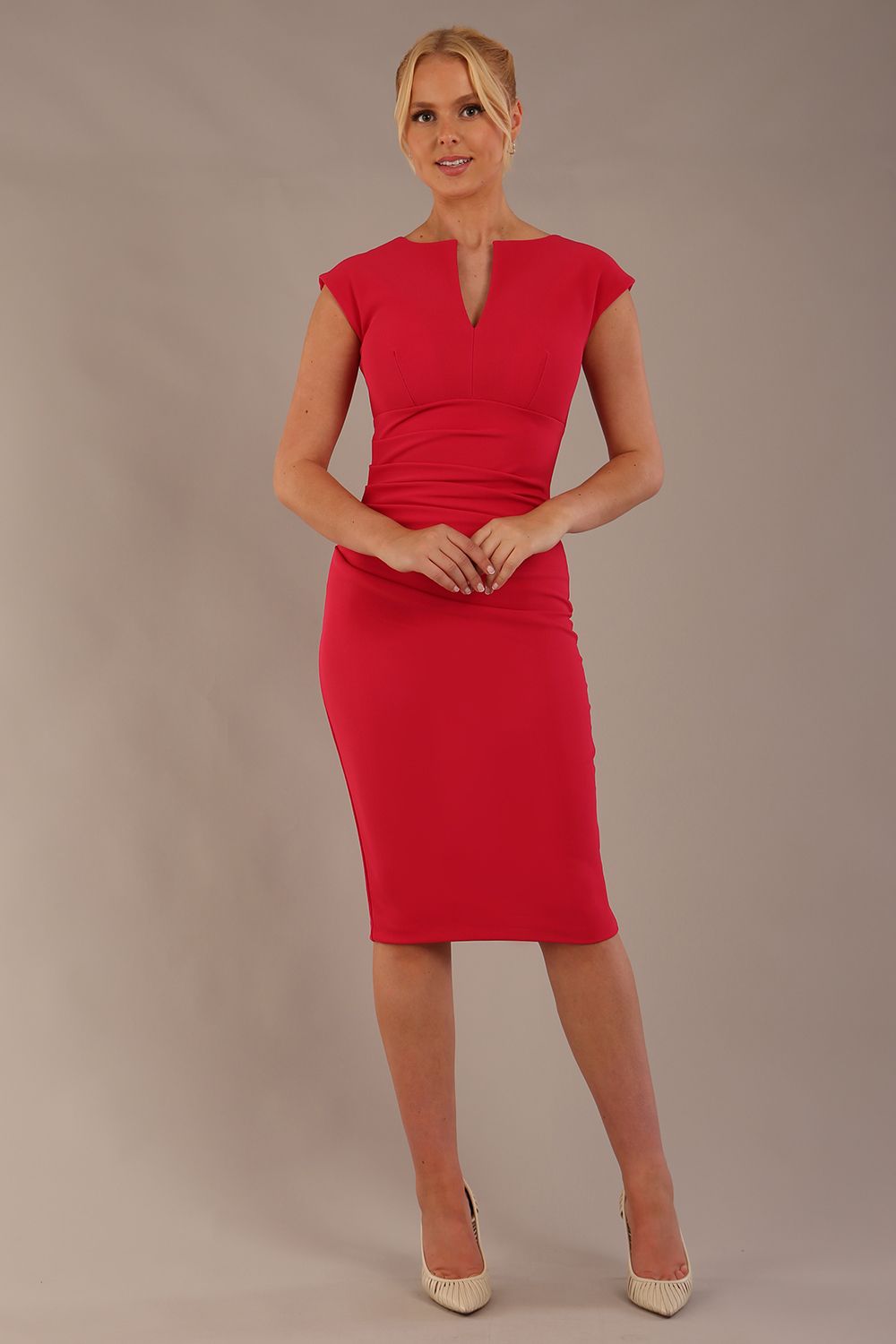 model wearing diva catwalk lydia sleeveless pencil flattering fitted plain dress with split neckline and pleating across the body Raspberry pink front (Raspberry Pink)