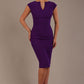 model wearing diva catwalk lydia sleeveless pencil flattering fitted plain dress with split neckline and pleating across the body passion purple front (Passion Purple)