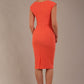 model wearing diva catwalk lydia sleeveless pencil flattering fitted plain dress with split neckline and pleating across the body sea coral back (Sea Coral)