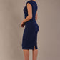 model wearing diva catwalk lydia sleeveless pencil flattering fitted plain dress with split neckline and pleating across the body in navy blue sheath dress back side (Navy Blue)