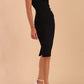 brunette model wearing diva catwalk lydia sleeveless pencil flattering fitted plain dress with split neckline and pleating across the body Midnight Blue front