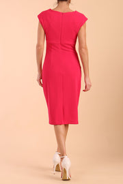 brunette model wearing diva catwalk lydia sleeveless pencil flattering fitted plain dress with split neckline and pleating across the body Virtual Pink BACK