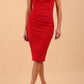 brunette model wearing diva catwalk lydia sleeveless pencil flattering fitted plain dress with split neckline and pleating across the body true red front