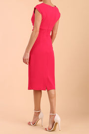 brunette model wearing diva catwalk lydia sleeveless pencil flattering fitted plain dress with split neckline and pleating across the body Virtual Pink side back