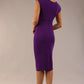 brunette model wearing diva catwalk lydia sleeveless pencil flattering fitted plain dress with split neckline and pleating across the body passion purple back