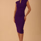 brunette model wearing diva catwalk lydia sleeveless pencil flattering fitted plain dress with split neckline and pleating across the body passion purple