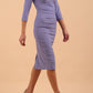 model wearing Diva Catwalk pencil three quarter sleeve dress with a split neckline and pleating across the tummy in vista blue front