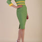 Model wearing Diva catwalk Paeonia dress square neckline with a vent in Citrus Green with Daffodil Yellow and Citrus Green stripes around the waist and three quarter sleeve with Daffodil Yellow contrast finish front