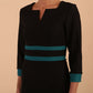 brunette model wearing Diva catwalk Paeonia dress square neckline with a vent in black with Pacific Green and black stripes around the waist and three quarter sleeve with Pacific Green contrast finish detail